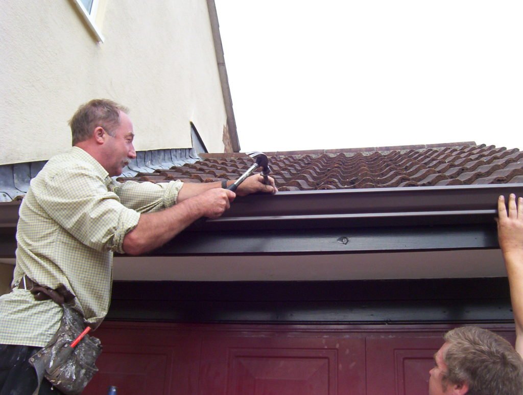 fixing guttering with nail